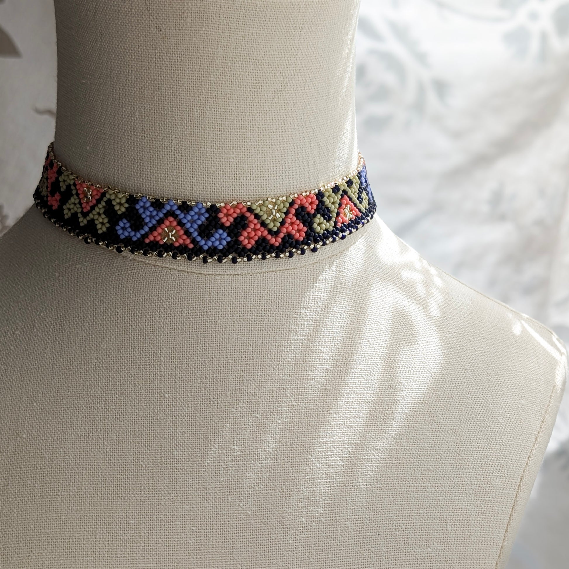 Ukrainian beaded choker necklace on a mannequin