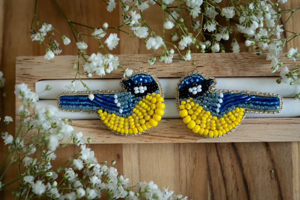 Bird pin in the colors of the Ukrainian flag