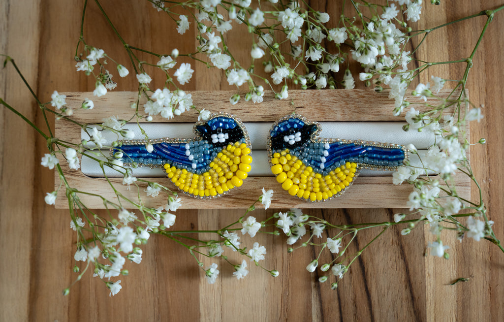 Bird pin in the colors of the Ukrainian flag