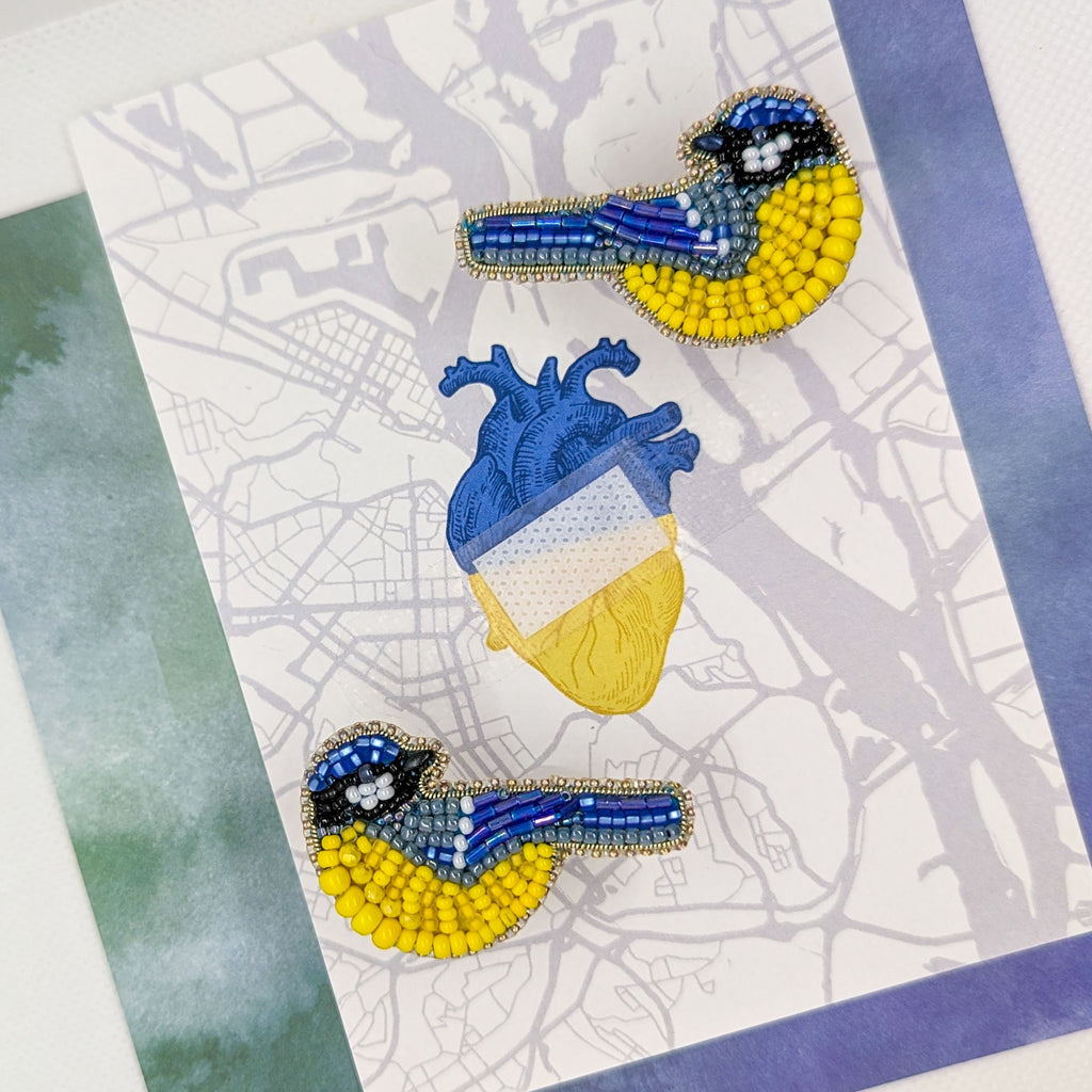 Bird pin in the colors of the Ukrainian flag