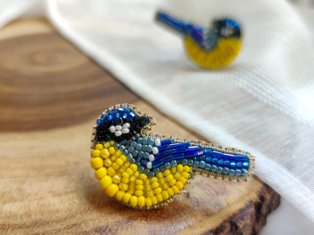 Bird pin in the colors of the Ukrainian flag