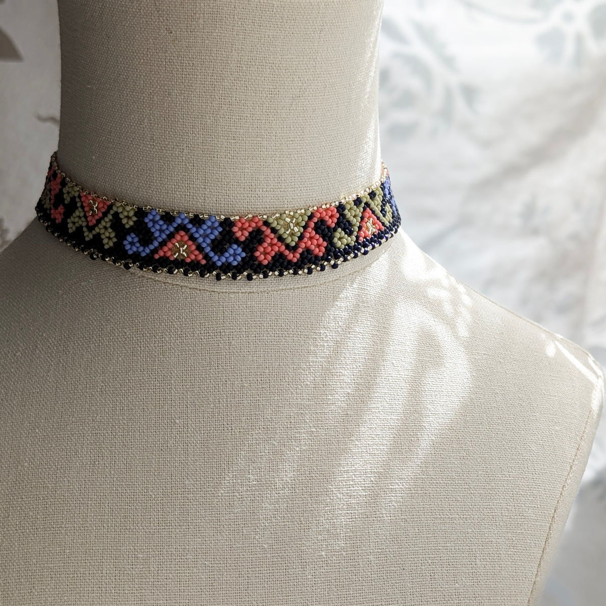Ukrainian beaded choker necklace on a mannequin